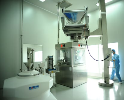 pillar lift being used in a pharmaceutical facility