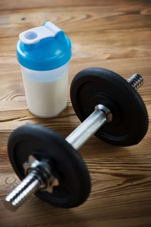 Sports Nutrition shake and Weights 